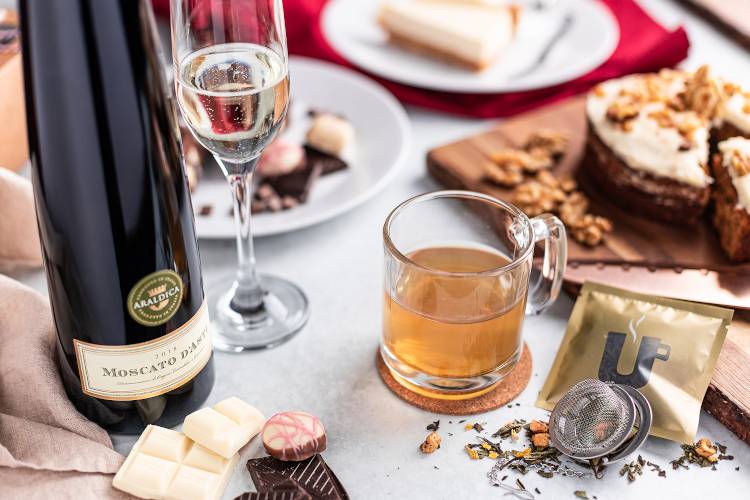 Sparkling wine with tea and cakes