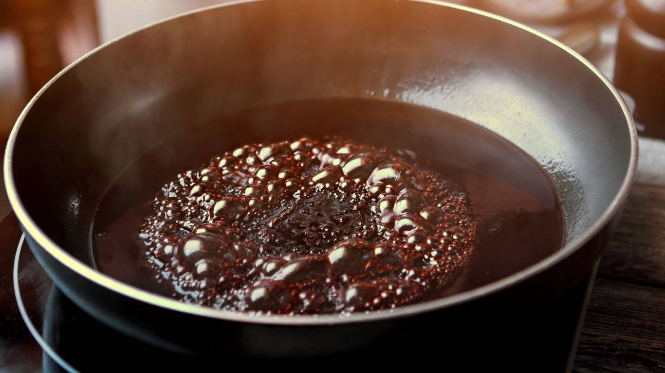 Liquid boiling on frying pan.