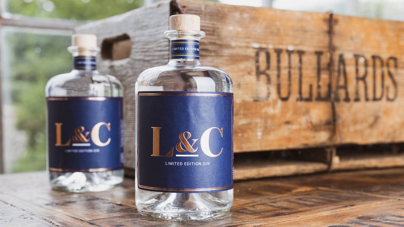 Two L&C Gin bottles by Bullards crate