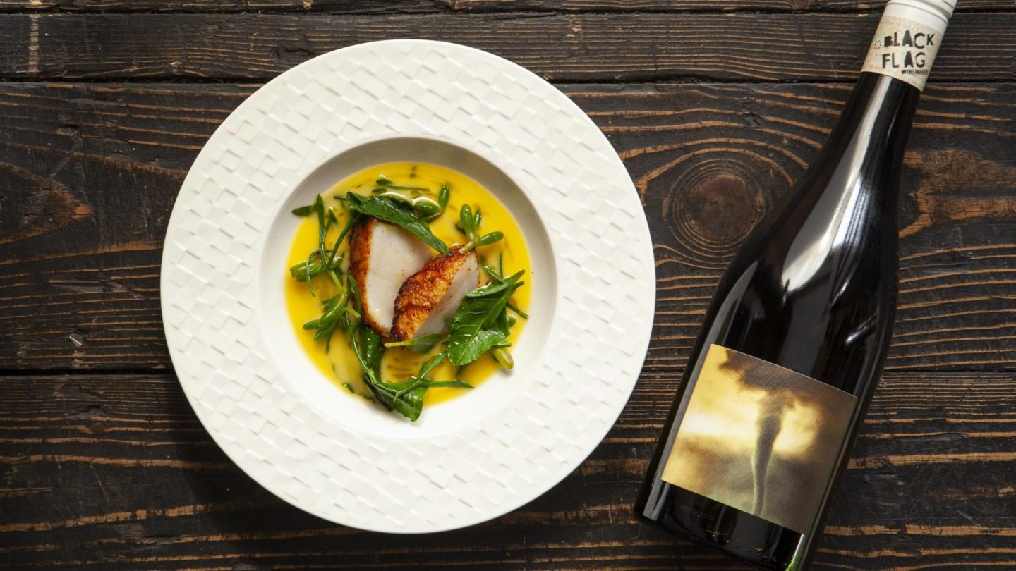 Roasted scallop with whey butter and sea herbs and Black Flag Chardonnay