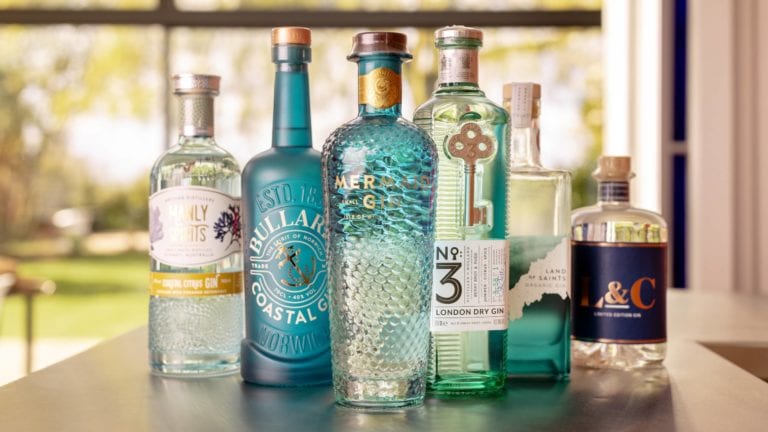 Line-up of gins available at Virgin Wines on a worktop