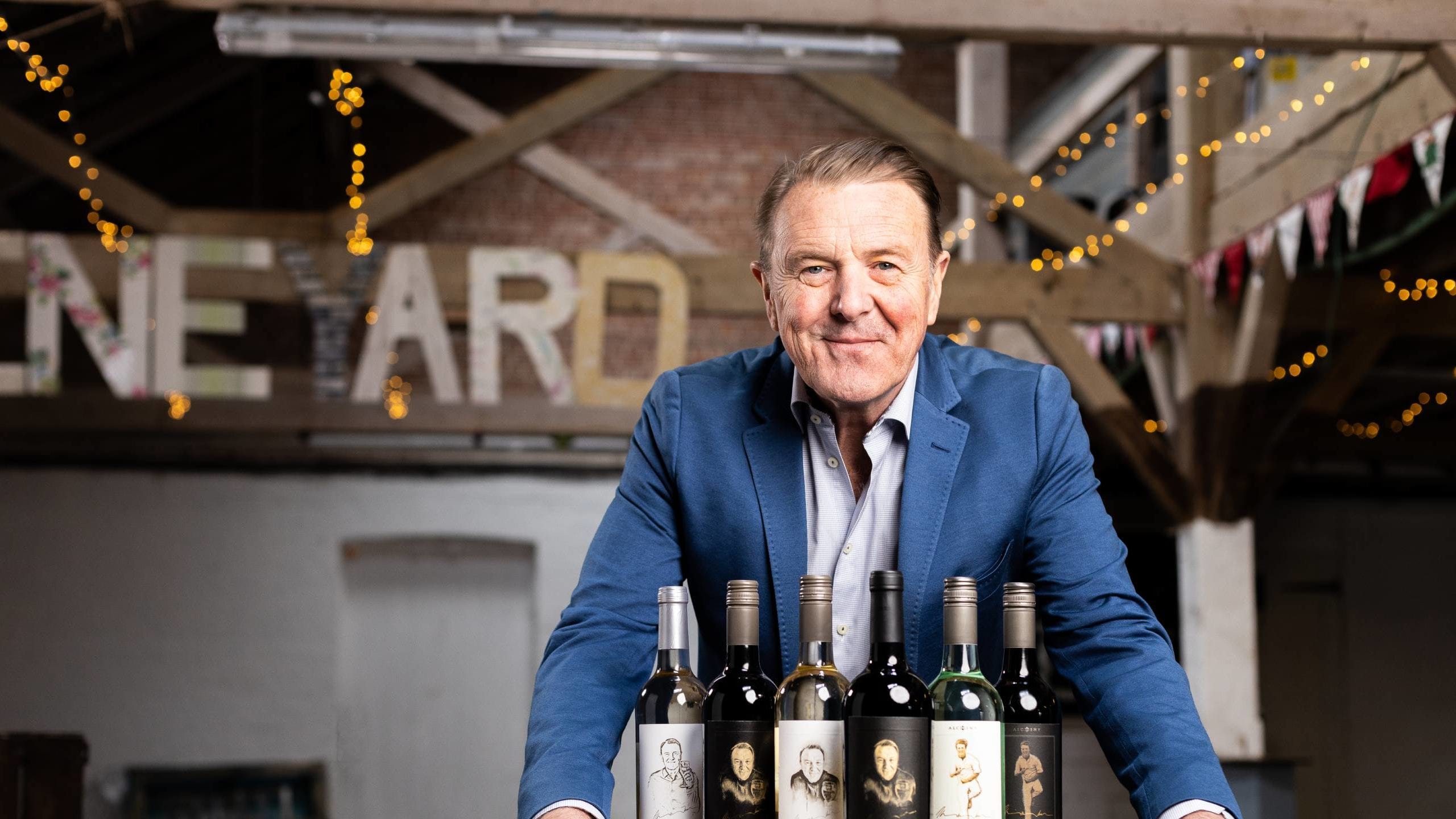 Phil Tufnell with all six wine bottles from his Tuffers' Tipple range