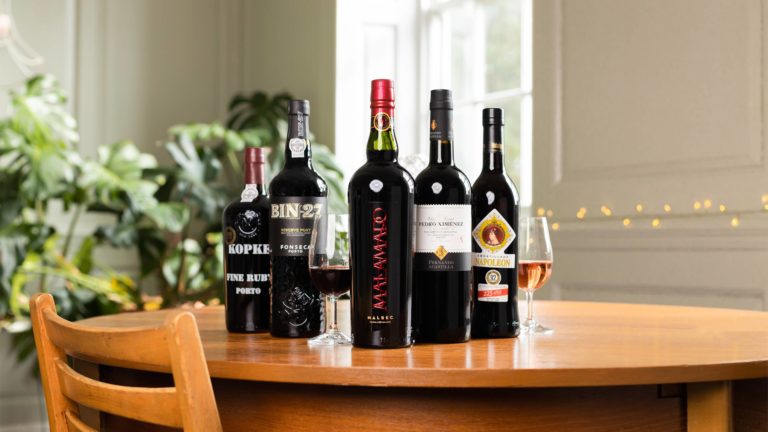 bottles of port, sherry and fortified malbec on table