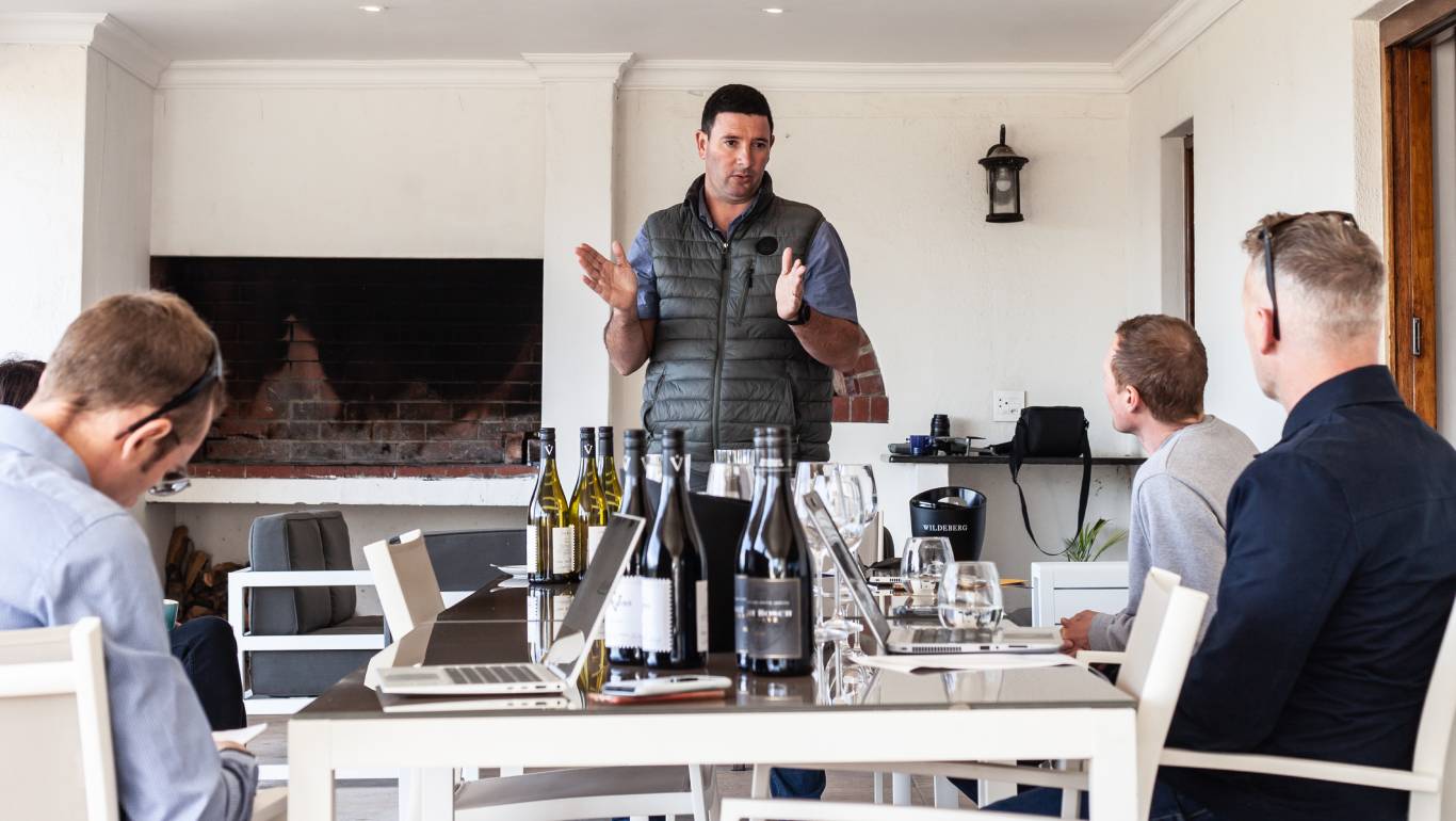 Virgin Wines Wine Buyers, Andrew and Dave, listening to winemaker Ryno Booysen at a wine tasting in South Africa