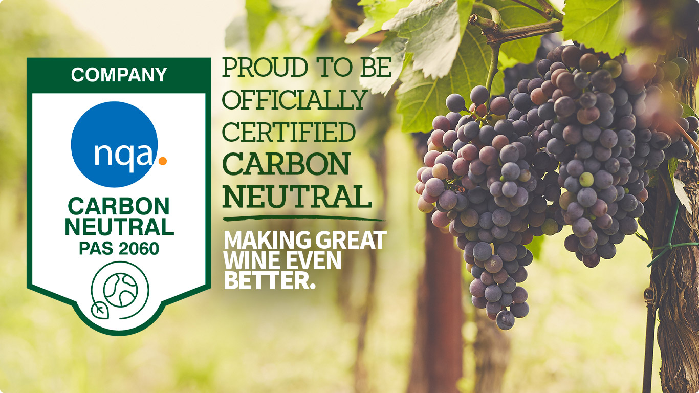 Close up of grapes in vienyard with Carbon Neutral badge