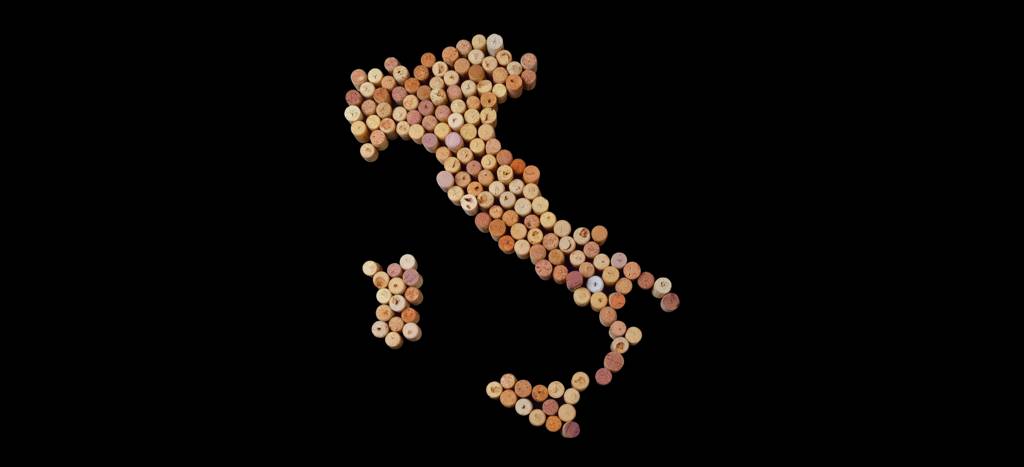 Map of Italy made with wine corks on a black background