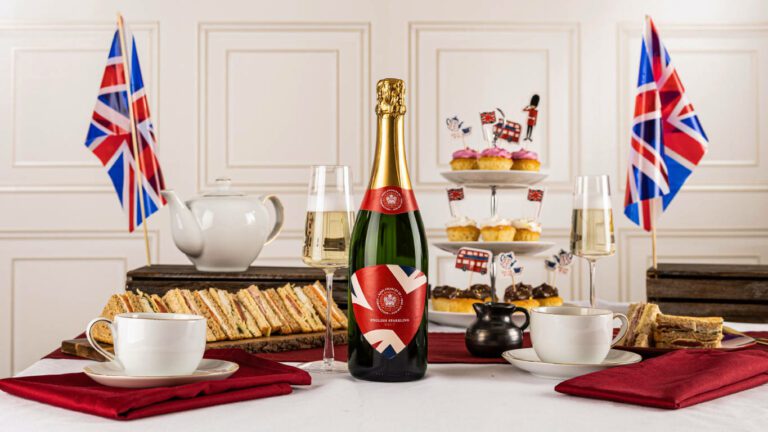 Coronation Limited Edition English Sparkling Brut by Virgin Wines for the Coronation of King Charles on a decorated table