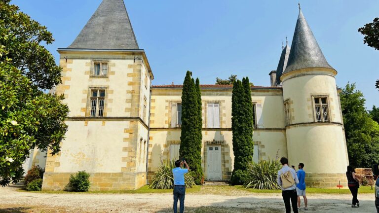 Tourists stood outside Chateau Escot in Bordeaux, France