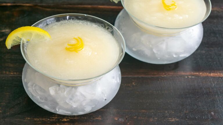 2 Sgroppino cocktails with lemon sorbet served with lemon garnish