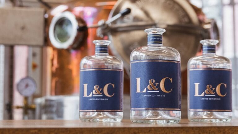 Three L&C Gin bottles in Bullards Distillery