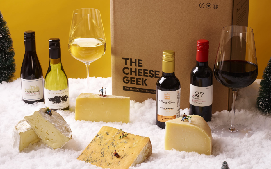 Cheese geek gift box with various cheese and 4 bottles of wine